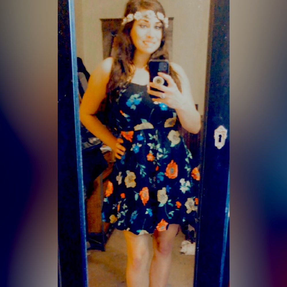 This is a black floral print multi color dress